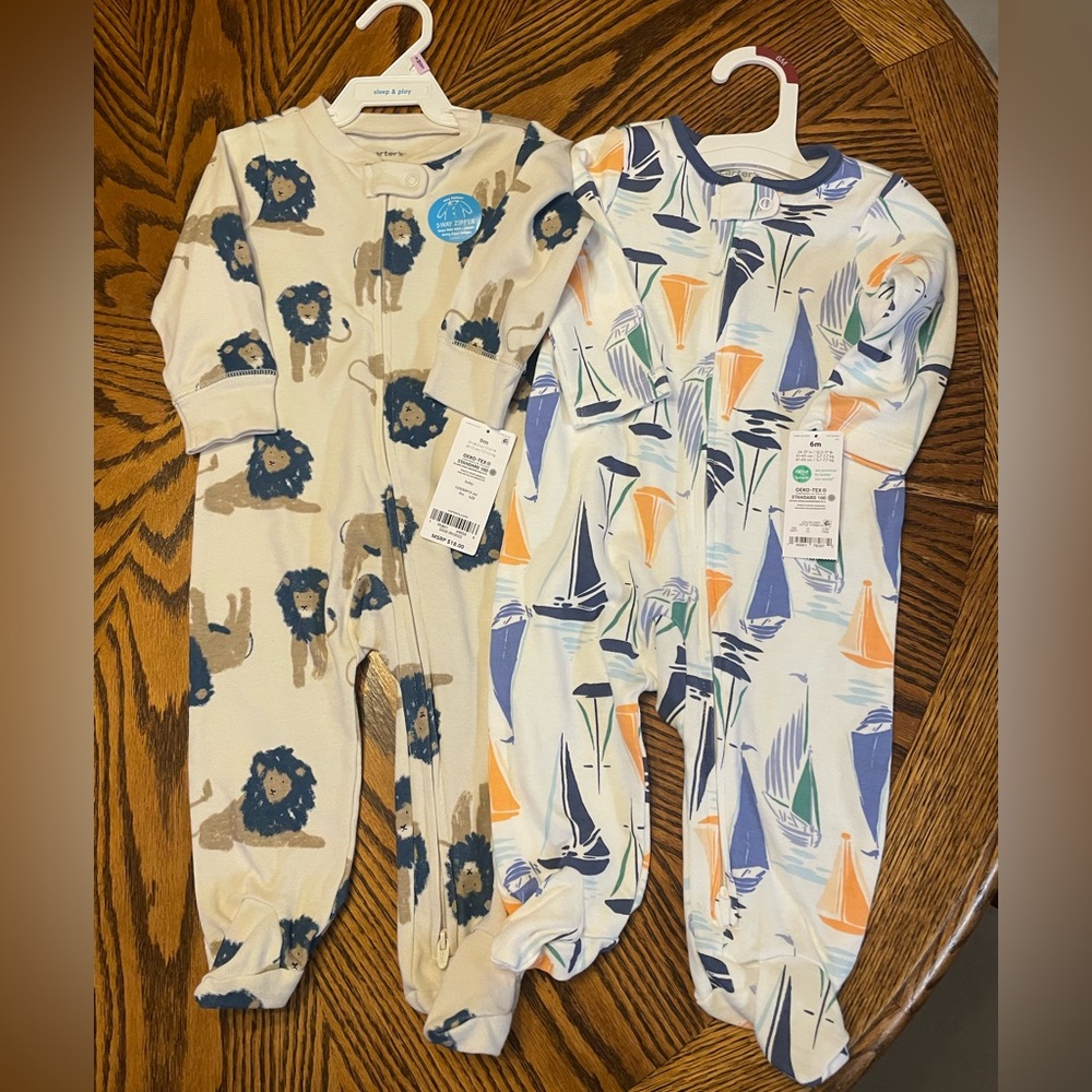 NWT 2 Carter’s infant sleepers - one size 6 month and one size 9 month